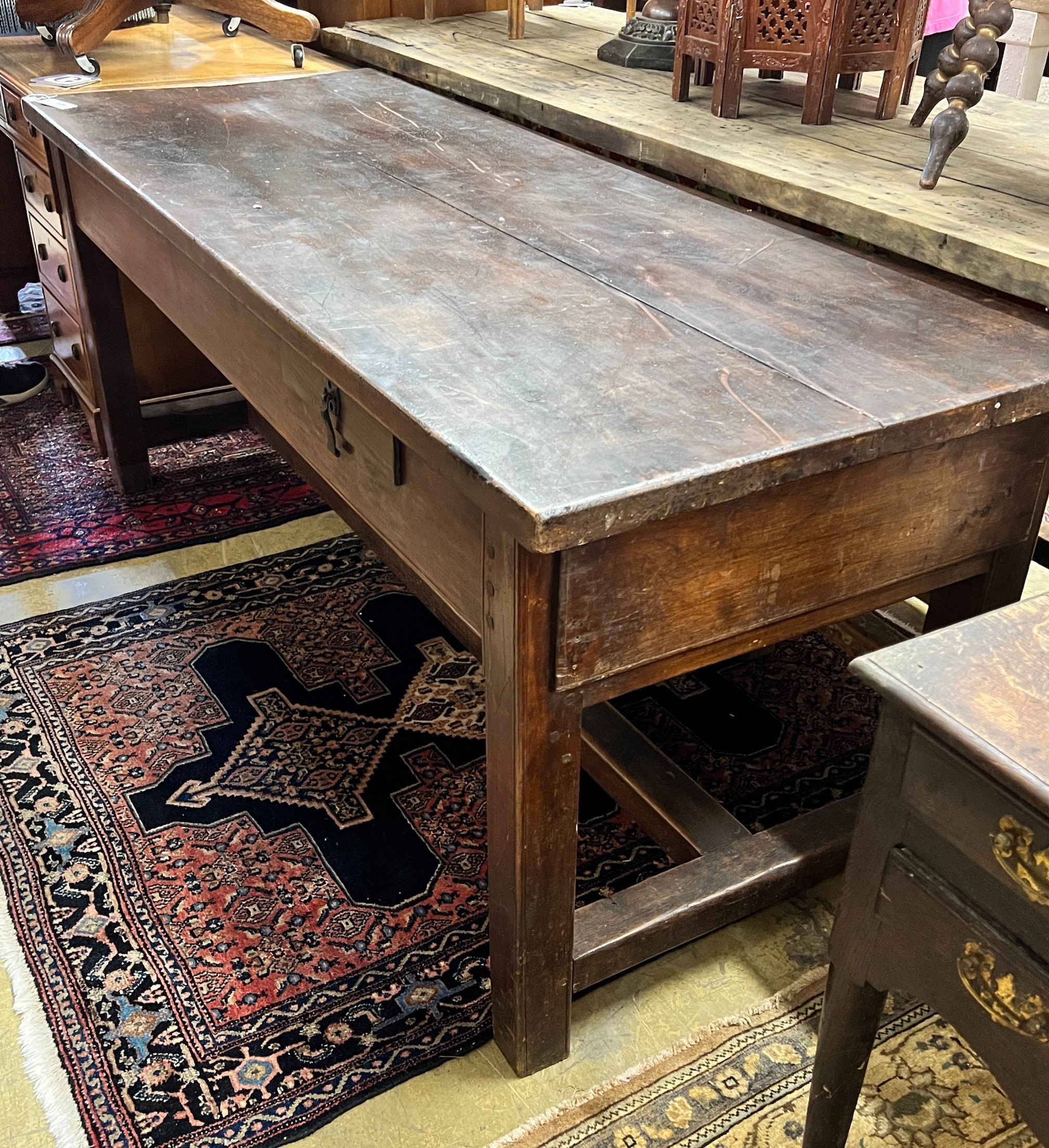 A 19th century French plank top rectangular extending kitchen table, length 190cm, width 72cm, height 78cm